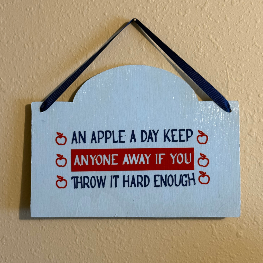 An Apple a Day Keeps Anyone Away If You Throw It Hard Enough Sign
