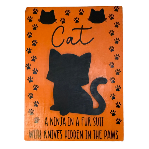 Cat: A Ninja In A Fur Suit With Knives Hidden In The Paws Sign