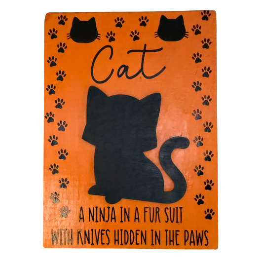 Cat: A Ninja In A Fur Suit With Knives Hidden In The Paws Sign