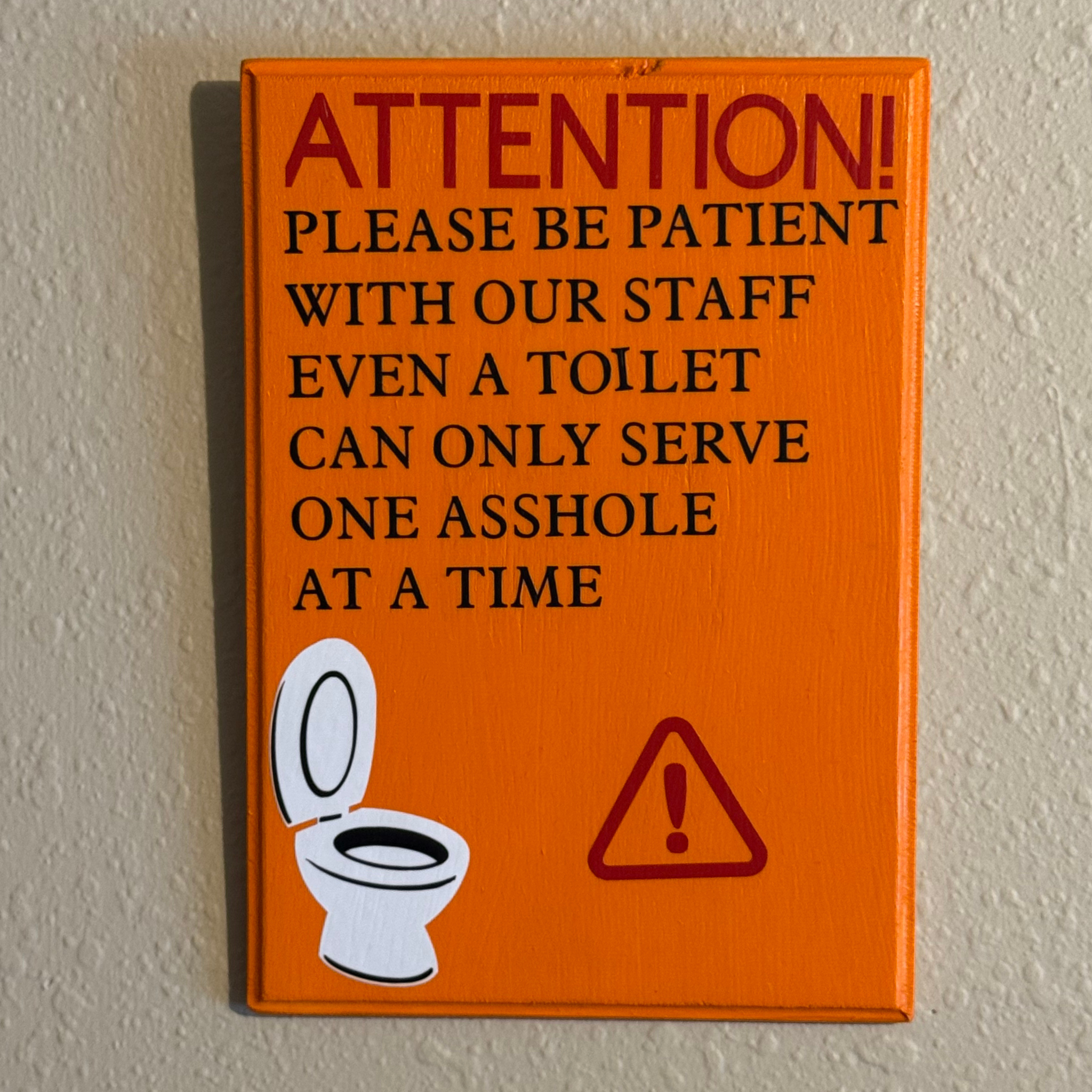 Attention! Please Be Patient With Our Staff.  Even A Toilet Can Only Handle One Asshole At A Time Sign