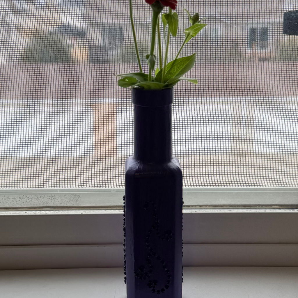 Vibrant Purple and Black Glass Decorative Bottle