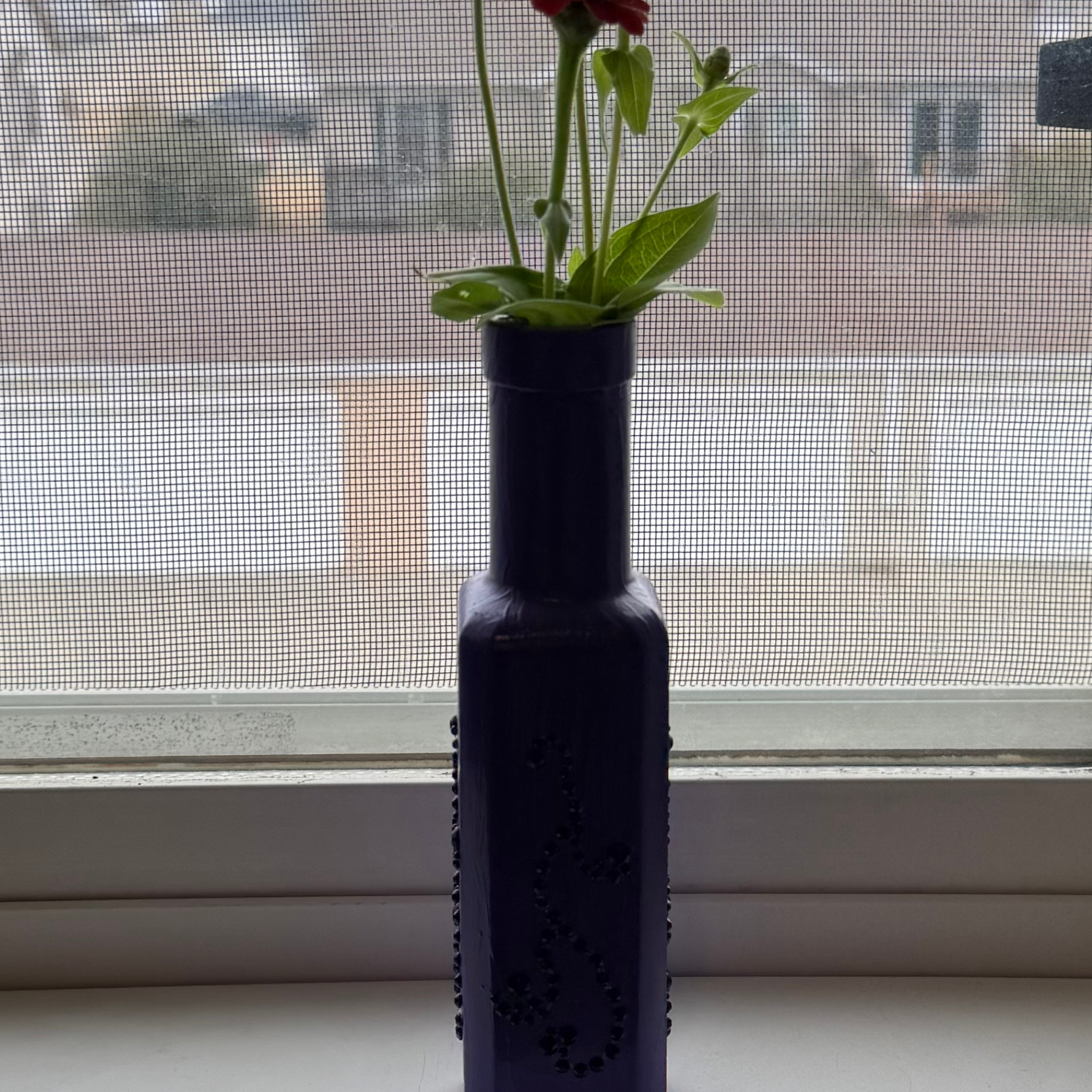 Vibrant Purple and Black Glass Decorative Bottle