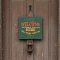 Welcome, We Know You Are Here, The Dogs Told Us Sign